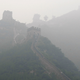 Tourists walk along the Great Wall on a hazy day in Juyongguan, as the opening day of the Beijing 2008 Olympic Games approaches, August 4, 2008. REUTERS/Stefano Rellandini